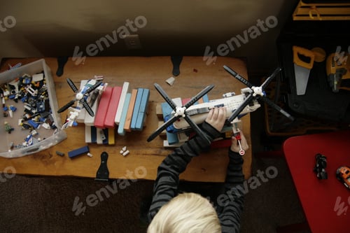 Preview: boy playing with legos