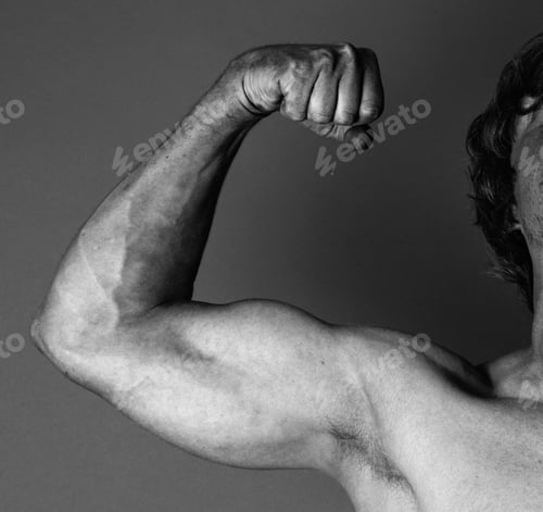 Preview: Close up of mans flexed biceps