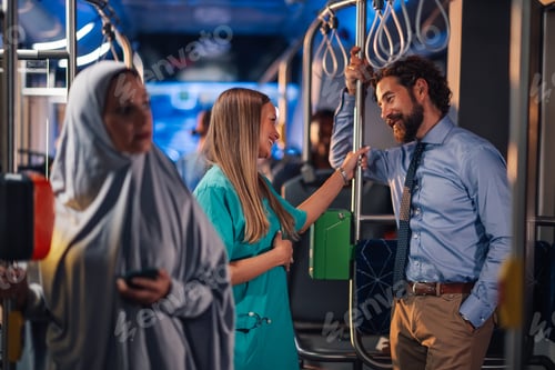 Preview: Nurse chatting with businessman on a bus during commute