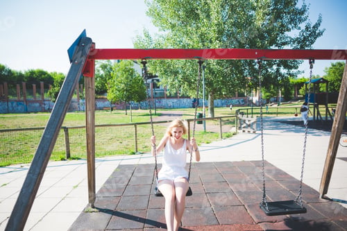 Preview: young blonde woman in the city