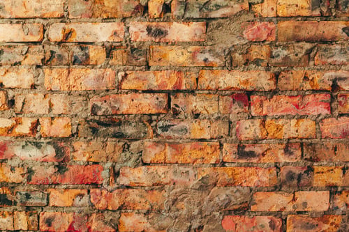 Preview: Old weathered brown brick wall for background