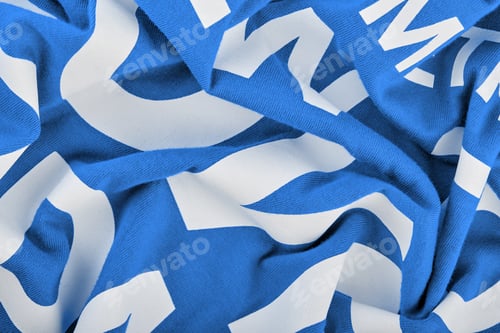 Preview: Cotton Knitted Fabric. Texture Of A Blue Fabric With A White Print.
