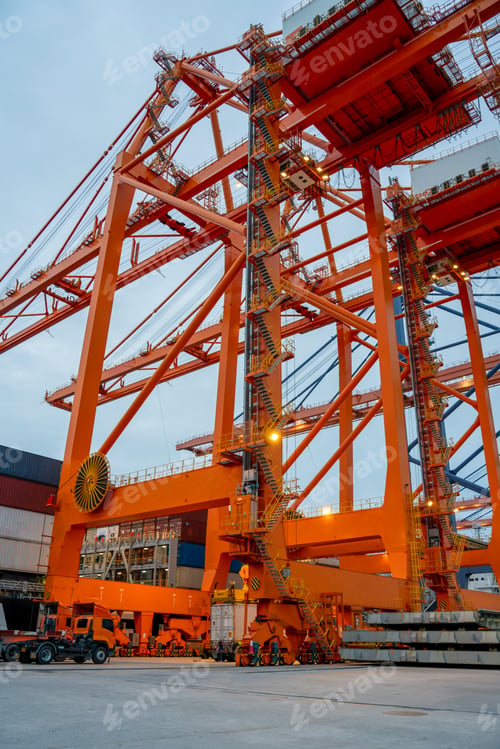 Preview: Crane loading cargo container freight container ship in the international terminal logistics