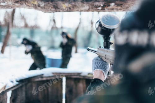 Preview: Paintball player shooting at the enemy team