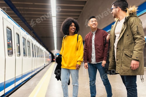 Preview: Group of friends waiting the train in the platform of subway station.