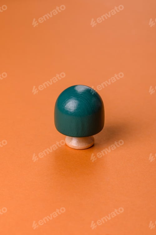 Preview: Wooden model of a tree with a green crown and trunk on a orange background