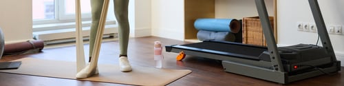 Preview: Exercising with Equipment in Modern Home Gym Setting