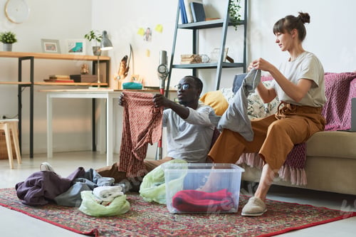 Preview: Couple putting things in order