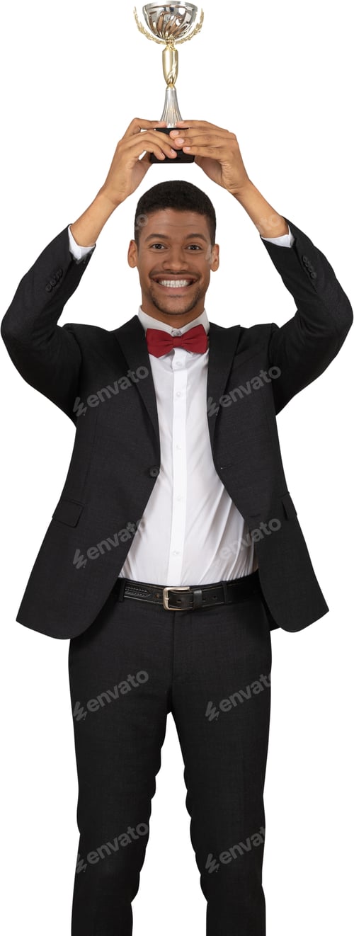 Preview: a young man in a suit and bow tie holding a trophy
