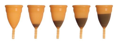 Preview: Orange menstrual cups on white background, collage. Banner design