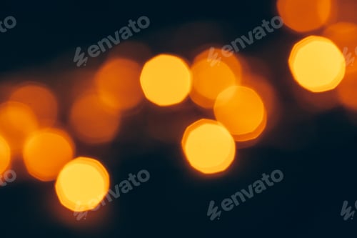 Preview: Abstract Gold bokeh sparkle on dark background