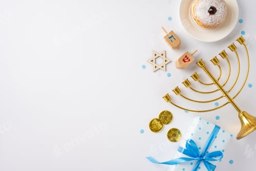 Preview: Bright Hanukkah scene featuring a menorah, dreidels, star, coins
