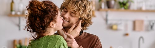 Preview: Young couple sharing joyful moments in a cozy modern apartment