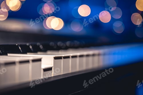 Preview: Piano keys close-up on a blurred background with bokeh.