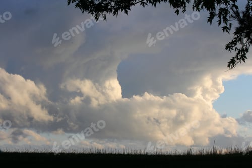 Preview: Huge Cumulus Cloud With A Hole - Photograph Of A Very Large Cumulus Cloud With What Looks Like An