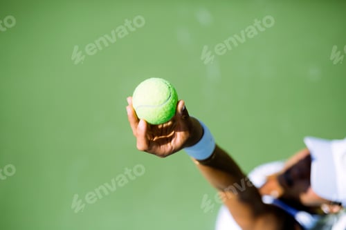 Preview: Beautiful female tennis player serving