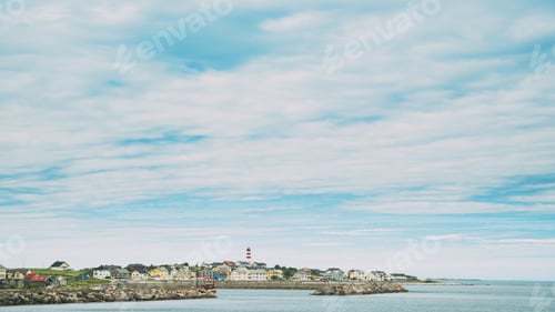 Preview: Alnesgard, Godoya, Norway. Old Alnes Lighthouse In Summer Day In Godoy Island Near Alesund Town