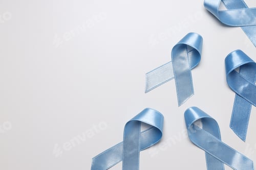 Preview: Blue satin ribbons on light background, Movember concept