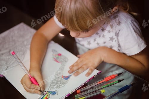 Preview: Cute little girl paint colouring book with multicoloured pens.