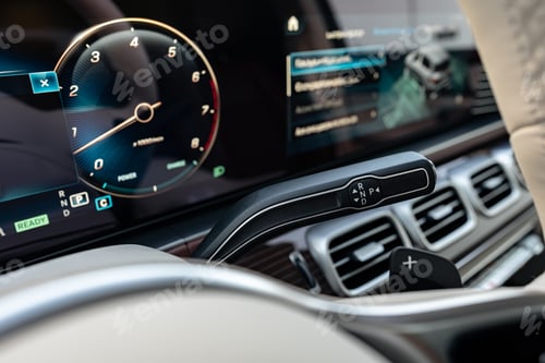 Preview: Modern luxury car interior with steering wheel, multimedia and dashboard