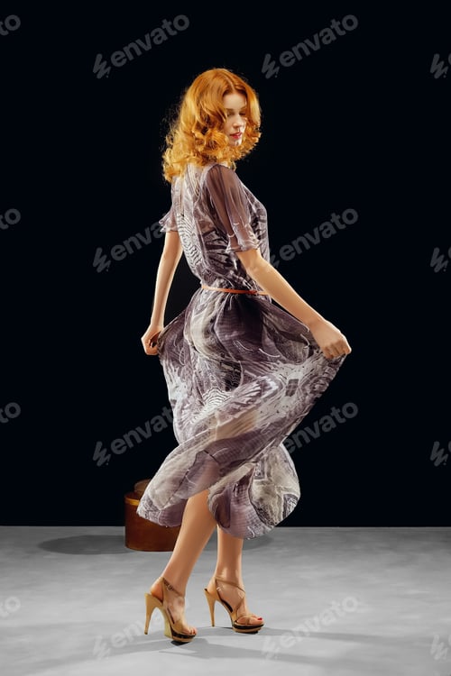 Preview: red hair model posing in fashion dress