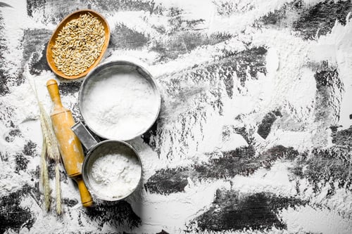 Preview: Flour in different sieve with grain, rolling pin and spikelets.