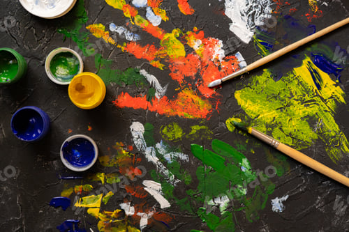 Preview: gouache paints with brushes, concrete surface decorations