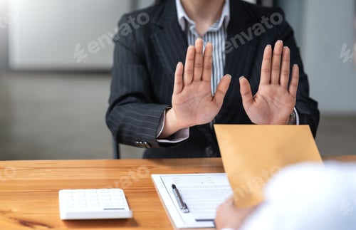 Preview: Authorities raising his hand refusing to accept bribes from customer.