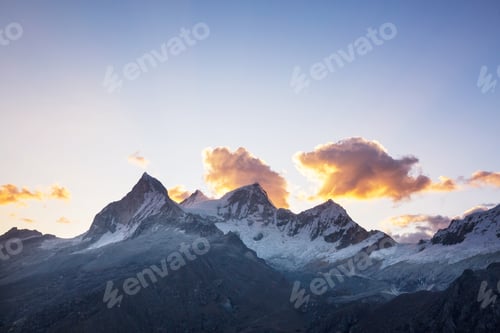 Preview: Snow Capped Mountain Range at Sunrise