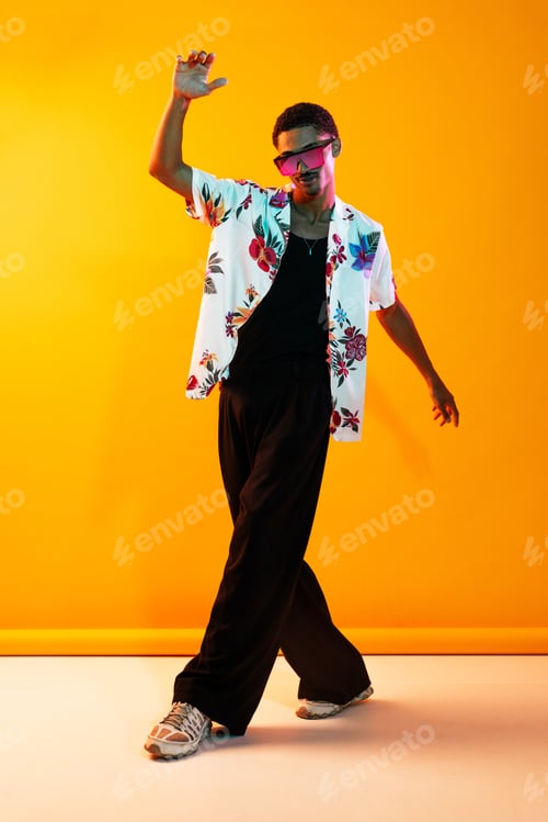 Preview: African man portrait in studio on colorful background