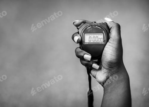 Preview: Hand holding a stopwatch