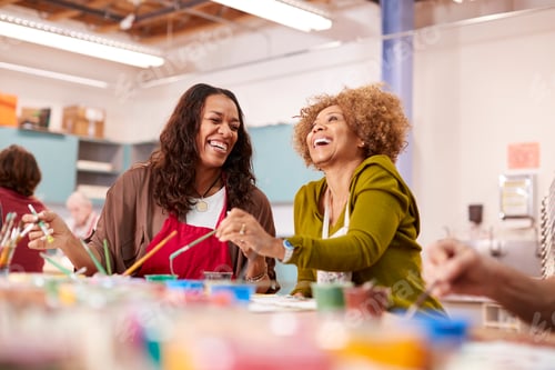 Preview: Two Mature Women Attending Art Class In Community Centre Together