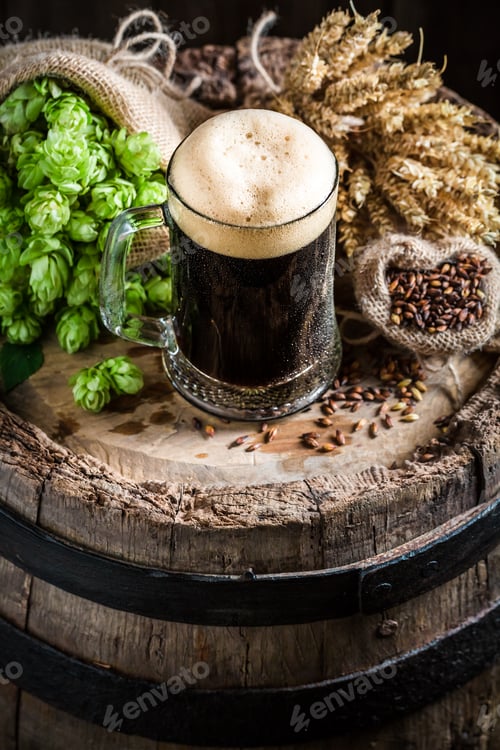 Preview: Dark beer with foam, hops and wheat