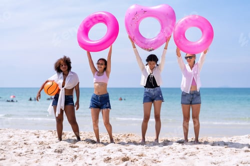 Preview: Teenage girl friendship enjoy laughing play on the blue sky sea and run to get water inflation toy