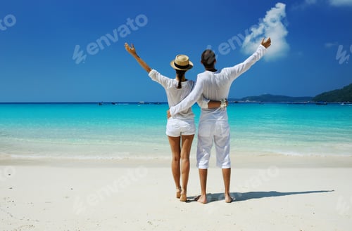 Preview: Couple In White On A Tropical Beach