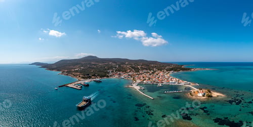 Preview: Elafonisos Peloponnese. Greece. Ferry departing from harbor to Pounta Lakonia, aerial drone view,