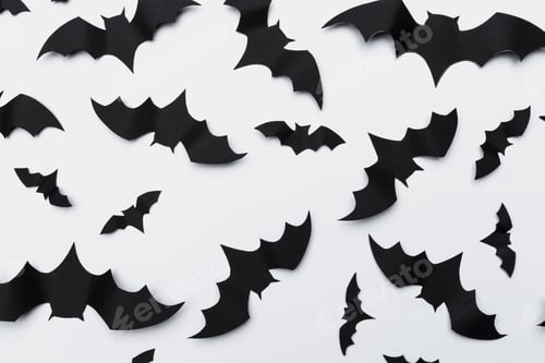 Preview: halloween and decoration concept - paper bats flying