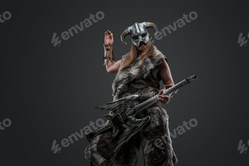 Preview: Crazy viking from past playing guitar against grey background
