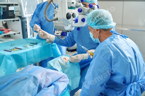 Preview: Two doctors doing laser vision correction in hospital