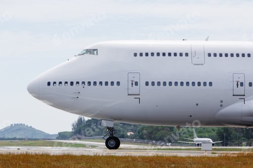 Preview: Modern passenger double-decker airplane taxiing to take off. Wide-body aircraft on runway
