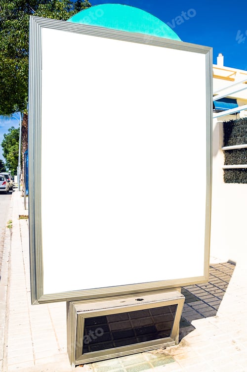 Preview: Vertical shot of a billboard at a bus station with space for text