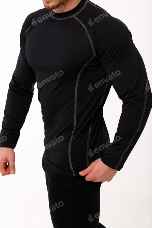 Preview: A man with a sporty physique in thermal underwear.