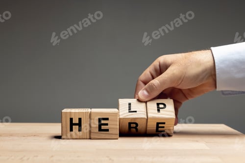 Preview: Male hand turning wooden cubes, blocks and change sense of word. Conceptual image about human rights