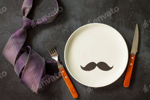 Preview: Happy fathers day concept. Table setting - plate, tie, cutlery