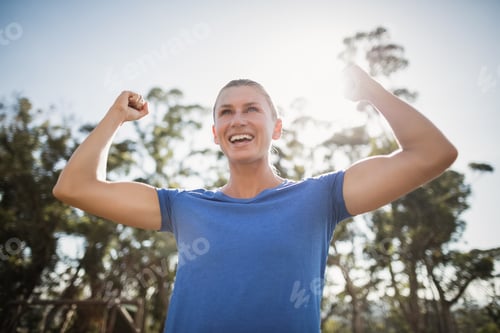 Preview: Fit woman cheering in joy
