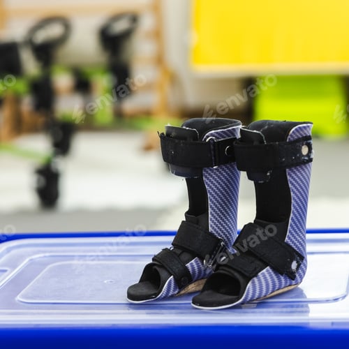 Preview: Orthotics for foot correction close-up, in bright rehabilitation center. Physical rehabilitation