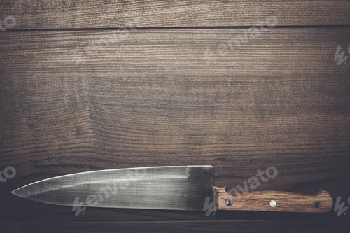 Preview: kitchen knife on brown wooden table