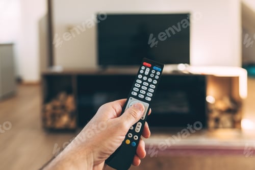 Preview: Male hand with Tv remote controller