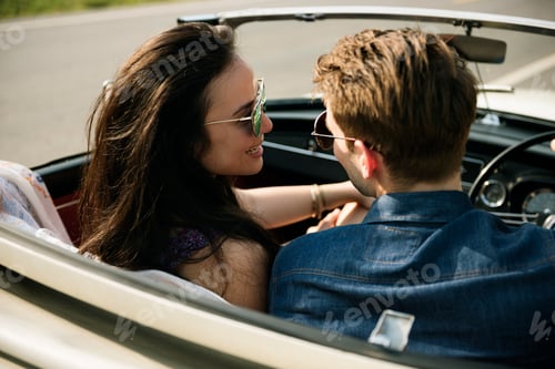 Preview: Couple Driving a Car Traveling on Road Trip Together