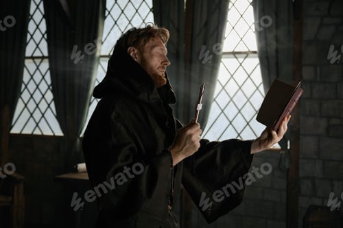 Preview: Medieval priest holding cross and holy bible performing exorcism rite